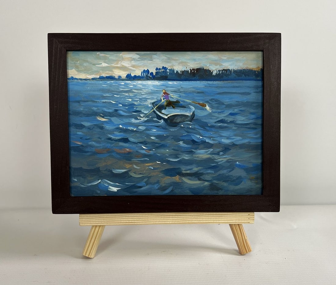 Oil painting In the evening in a boat Yuriy Suprunchuk: NoAAA4312 The painting "In the Evening in a Boat" captures a moment of solitude and contemplation as a lone figure rows across the vast expanse of water. The scene is bathed in the cool, calming hues