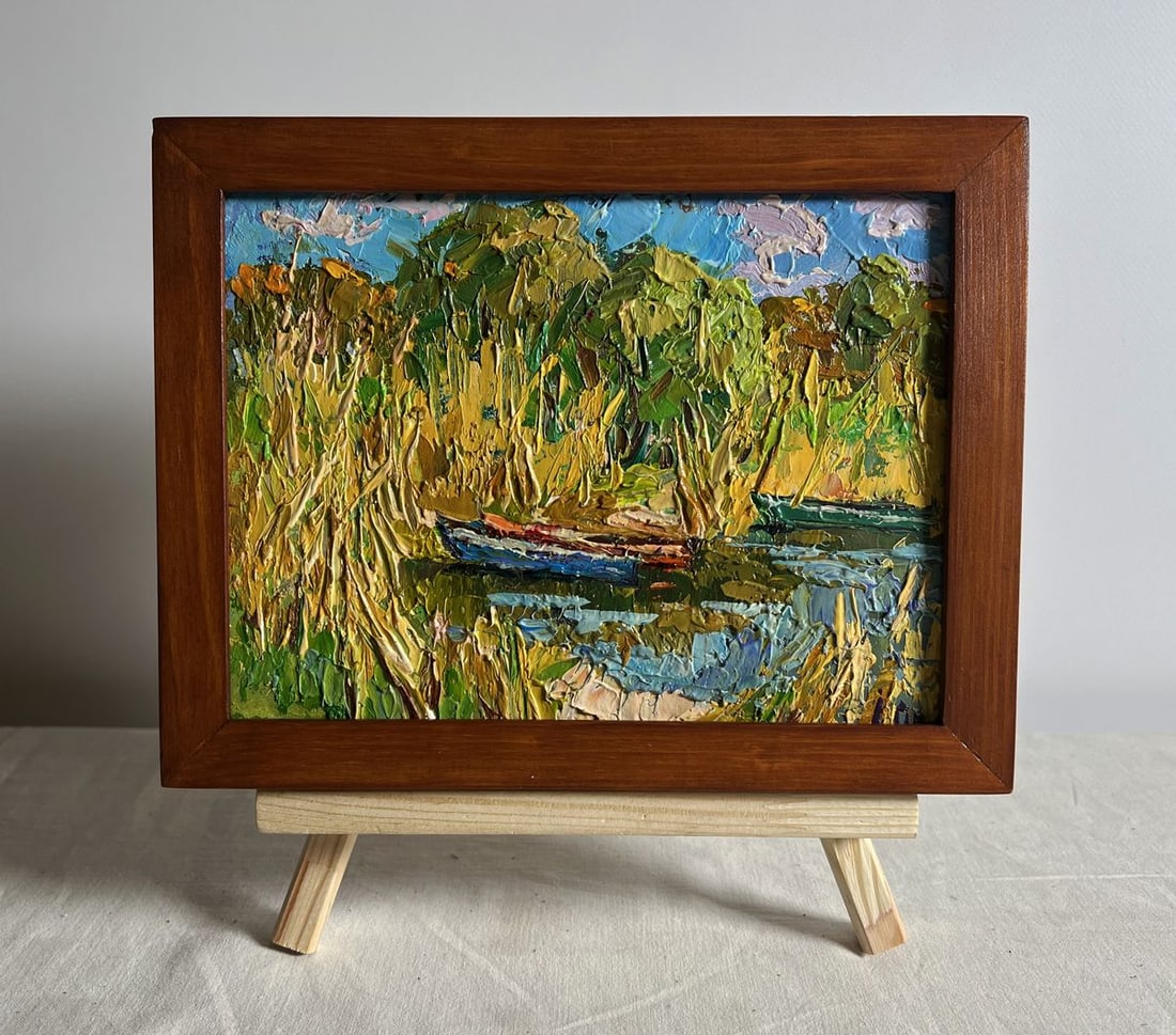 Oil painting Boats on the shore Alex Kalenyuk: NoAAA3887 This oil painting cardboard, titled "Boats on the shore", the painting immerses the viewer in a tranquil natural setting, where boats rest among tall reeds on the water's edge. The