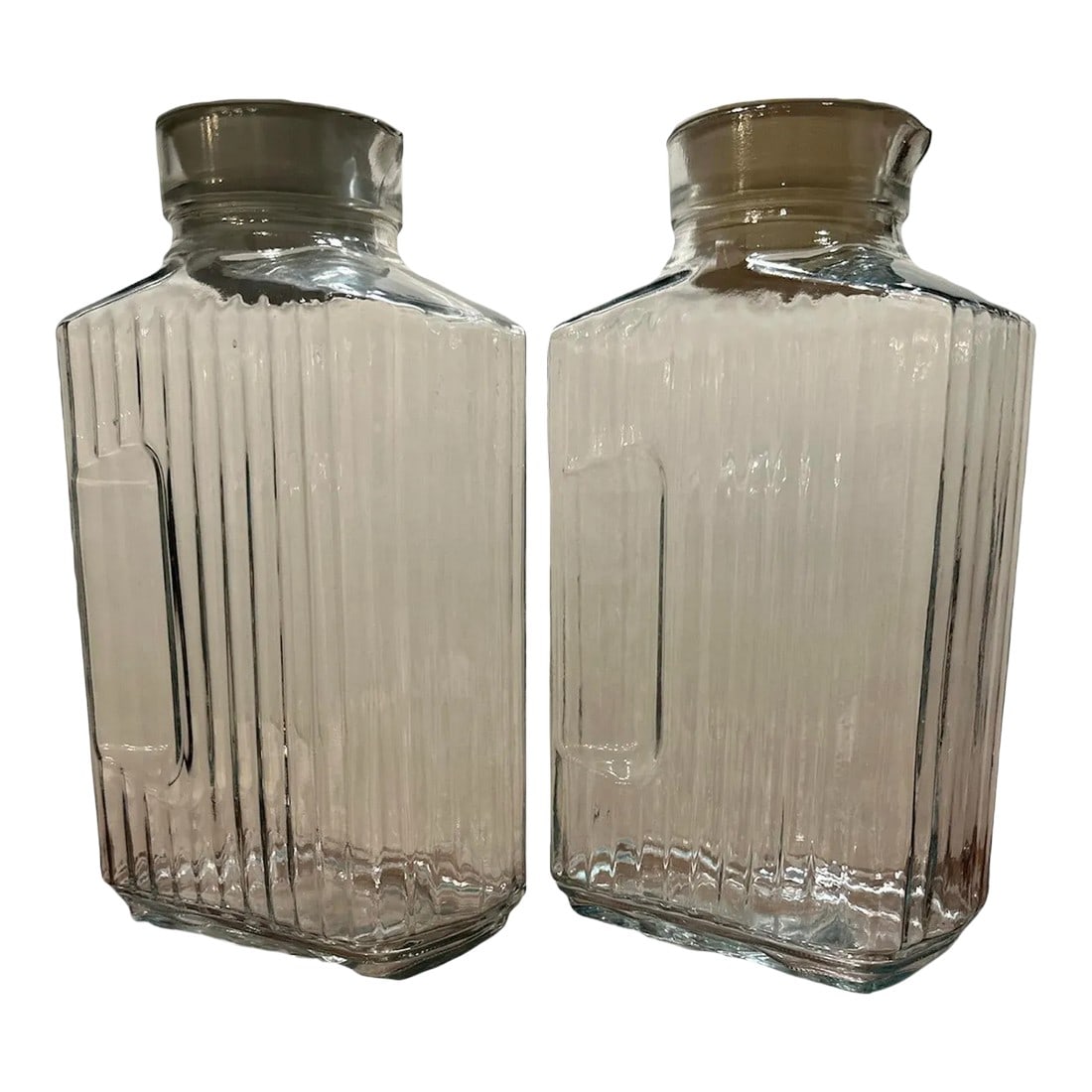 Vintage Anchor Hocking Refrigerator Glass Storage Jug Bottles- a Pair: Vintage Anchor Hocking refrigerator rectangular glass bottle. Set of 2 Switch to glass storage from plastic. Use for liquids, or dry goods in your pantry. See thru clear glass with ribbed design. 