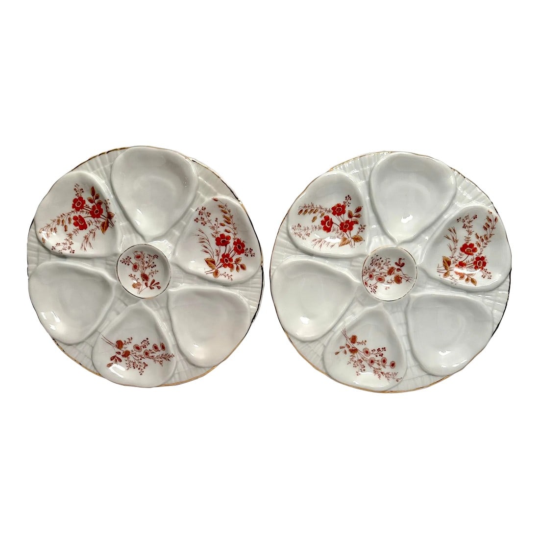 Vintage Oyster Plates 1940's Austria- A Pair: Offering a vintage pair of matching oyster plates. Enjoy oysters with dipping sauce in the center. 1940's Austria 9.5" round and 1" deep Orange-toned floral motif with gilding around rims.