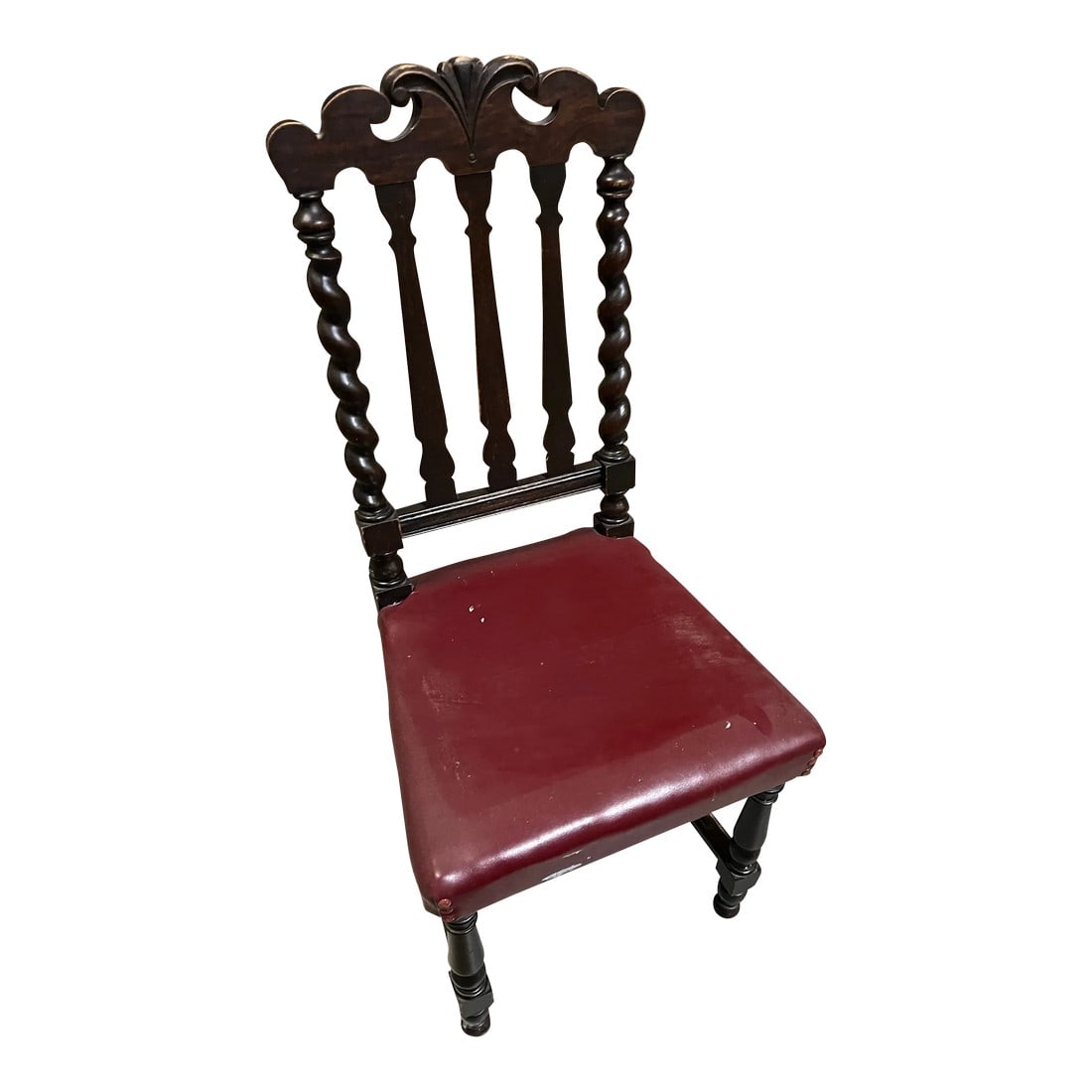 1970s Barley Twist Wooden Chair With Red Leather Cushion: Up for consideration is a beautiful barley twist wooden chair with a red leather cushion. This would look lovely in your home and it is a great find for the interior design enthusiast. Please check