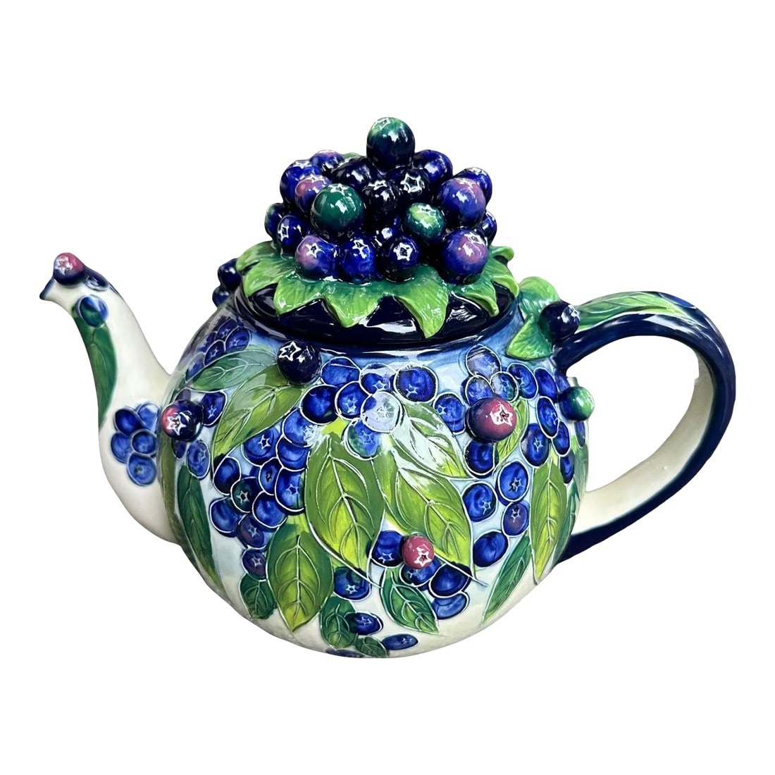 Vintage Jeanette McCall Majolica Blueberry Tea Pot: Gorgeous Majolica in blueberries! Excellent styling in the two tone coloring of the blueberries that pop around the teapot and creamer. Accented with green leaves and detailed in white all on a cream