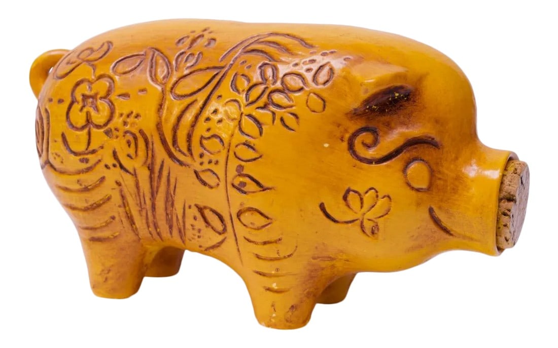 Mid-Century California Pottery Piggy Bank With Cork Stopper: Circa 1960s California Pottery 'piggy' bank with incised floral motif throughout. Lovely golden yellow color with the original cork stopper. Very nice condition with only slight wear consistent with