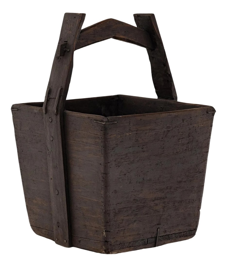 Provincial Chinese Grain Container, c. 1900: This hand-crafted wooden bucket was once used by farmers in Shanxi, China to transport their harvest of rice and grains over long distances. Counterbalanced by a second container, the pail would have