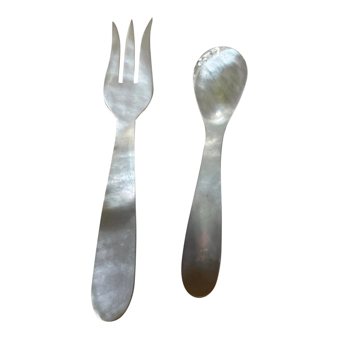 Pair of 1970s Mother-Of-Pearl Small Fork and Spoon: Up for consideration is a beautiful pair of mother-of-pearl fork and spoon set. These would look lovely in your home and they are a great find for the interior design enthusiast. Please check out my