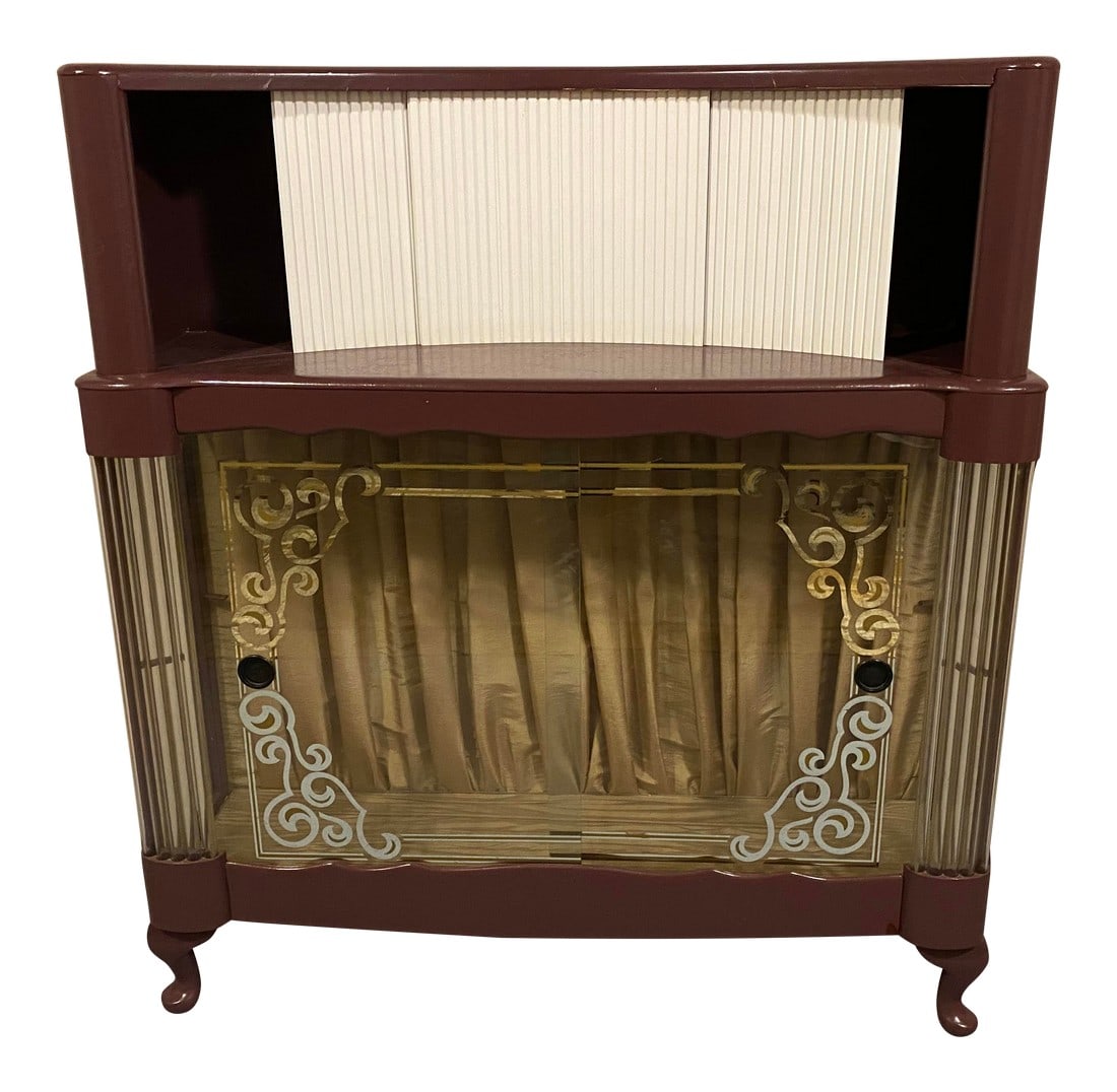 1920s Vintage Barber Shop Cabinet Bar: Funky old barber shop cabinet with a sliding door top and stenciled decorative glass doors below. Painted in a plum purple. Fabric-lined bottom with glass shelf. Would make awesome bar. Fun statement