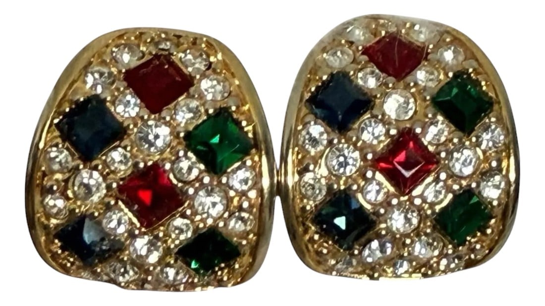 1980s Vintage Signed Swarovski Clip on Earrings, A Pair: Vintage SWAROVSKI Red, Green, Blue and Clear Swarovski Crystals set in gold plated metal. A pair of each color in diamond shape set amongst a bed of clear pave crystals. Clip on earrings with
