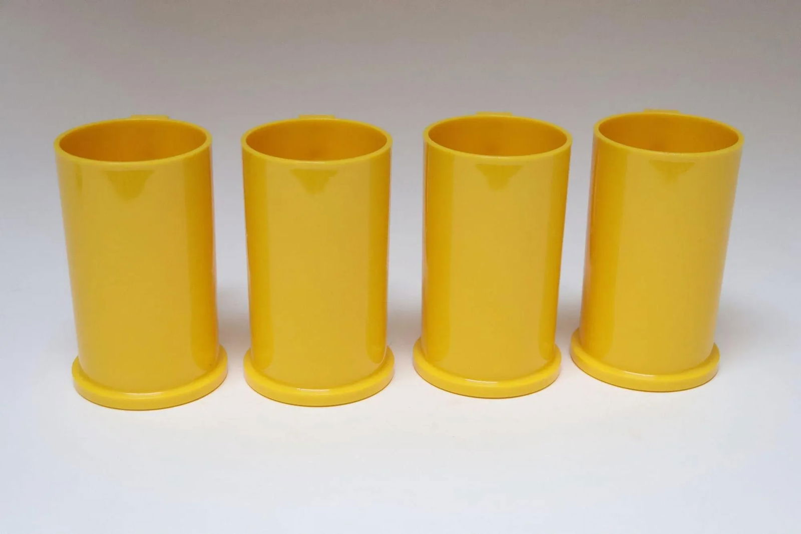 Set of Four Mid Century Modern Yellow Plastic Mugs / Tumblers by Gunnar Cyren for Dansk - 3