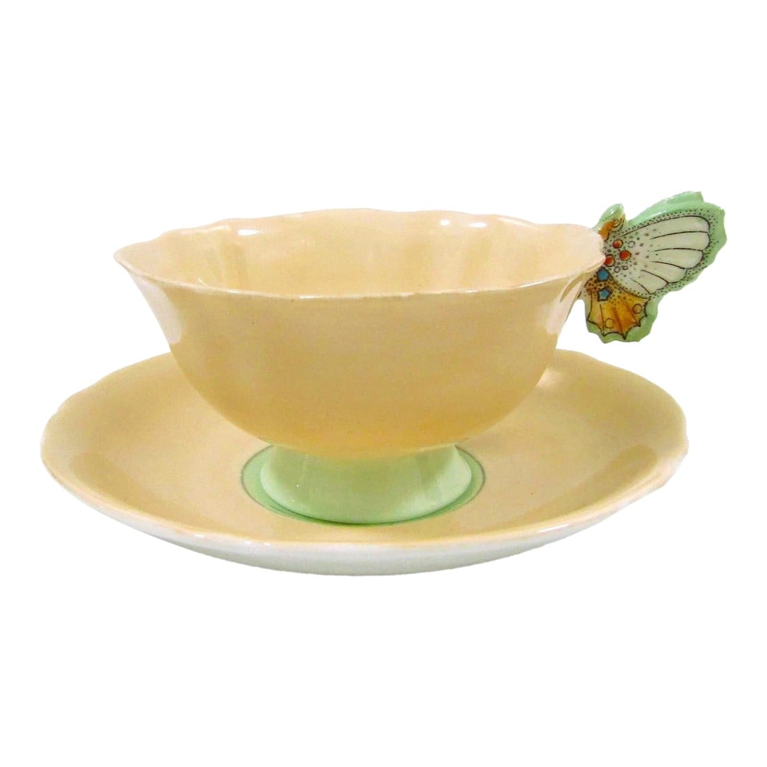 1940s Paragon Peach and Green Butterfly Handle Teacup and Saucer: Antique Paragon Peach and Green Butterfly Handle Teacup and Saucer 1940s Cup measures 5" wide handle to side, 4" diameter and 2 1/2" tall. Saucer measures 5 1/2" diameter and 3/4" tall. The Antique