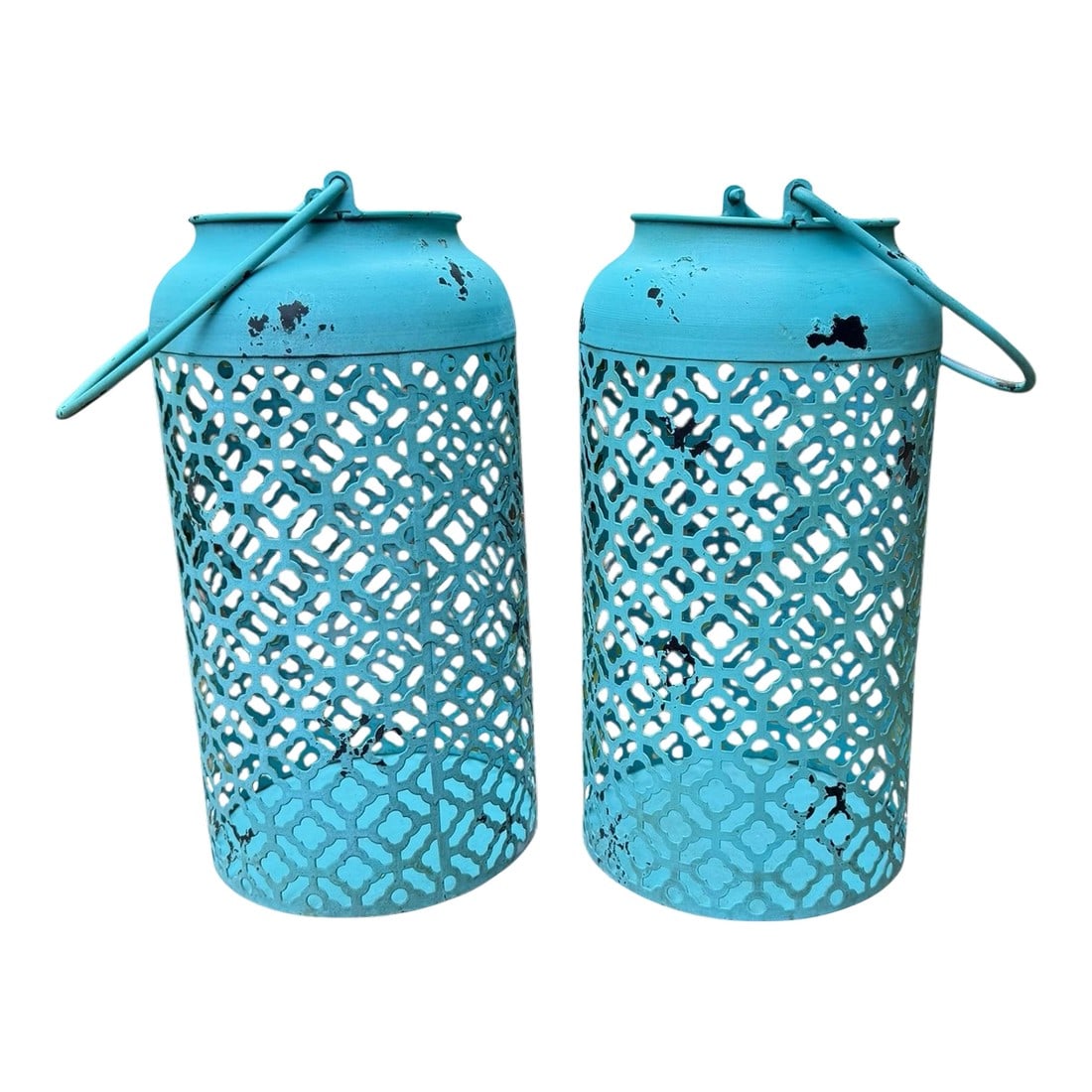 Vintage Blue Patina Lanterns -a Pair: Charming patina on this pair of metal lanterns. Reticulated in quatrefoil pattern with moveable handles. A nice splash of color and design to hang from hook in front or back patio, atop table or hang