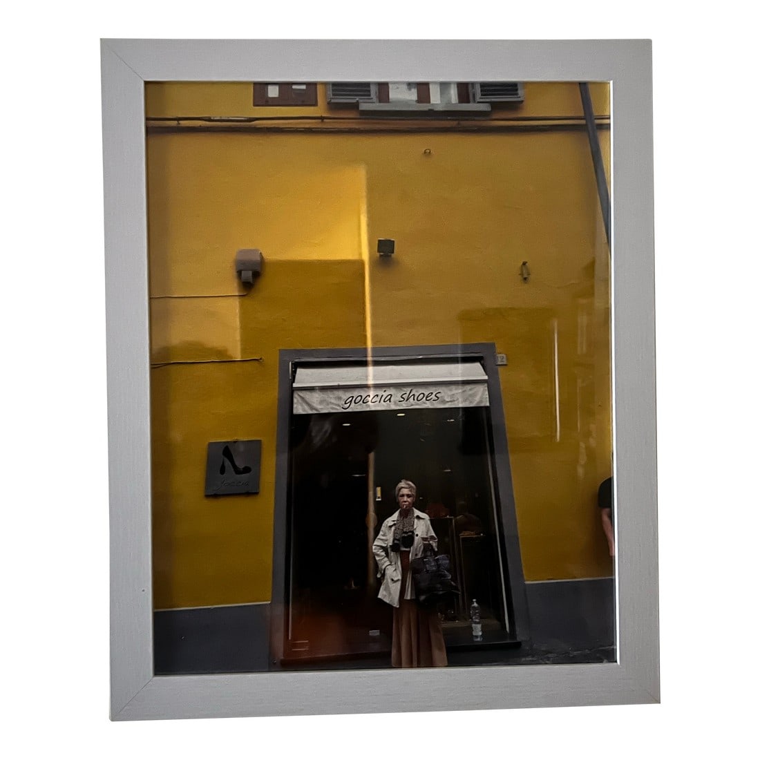 Centro Storico, Firenze, Framed Photograph , Woman With Cigarette at Goccia Shoes: This picture of an Italian woman smoking on a side street in Florence, Italy seemed so authentic. Her style and attitude is quintessential Florentine. I took two other images so it could be made into
