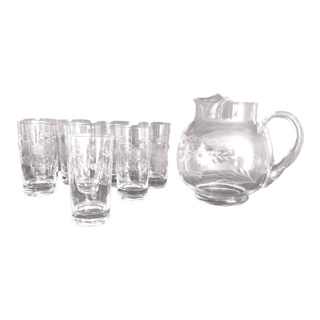1960s Large Pitcher and Eight Glasses, Etched With Flowers and Leaves - 9 Pieces: The auction house where I purchased these said they are Fostoria. As you can see from my listing, it is difficult to get a clear picture of the pattern on a clear glass object where you get a picture