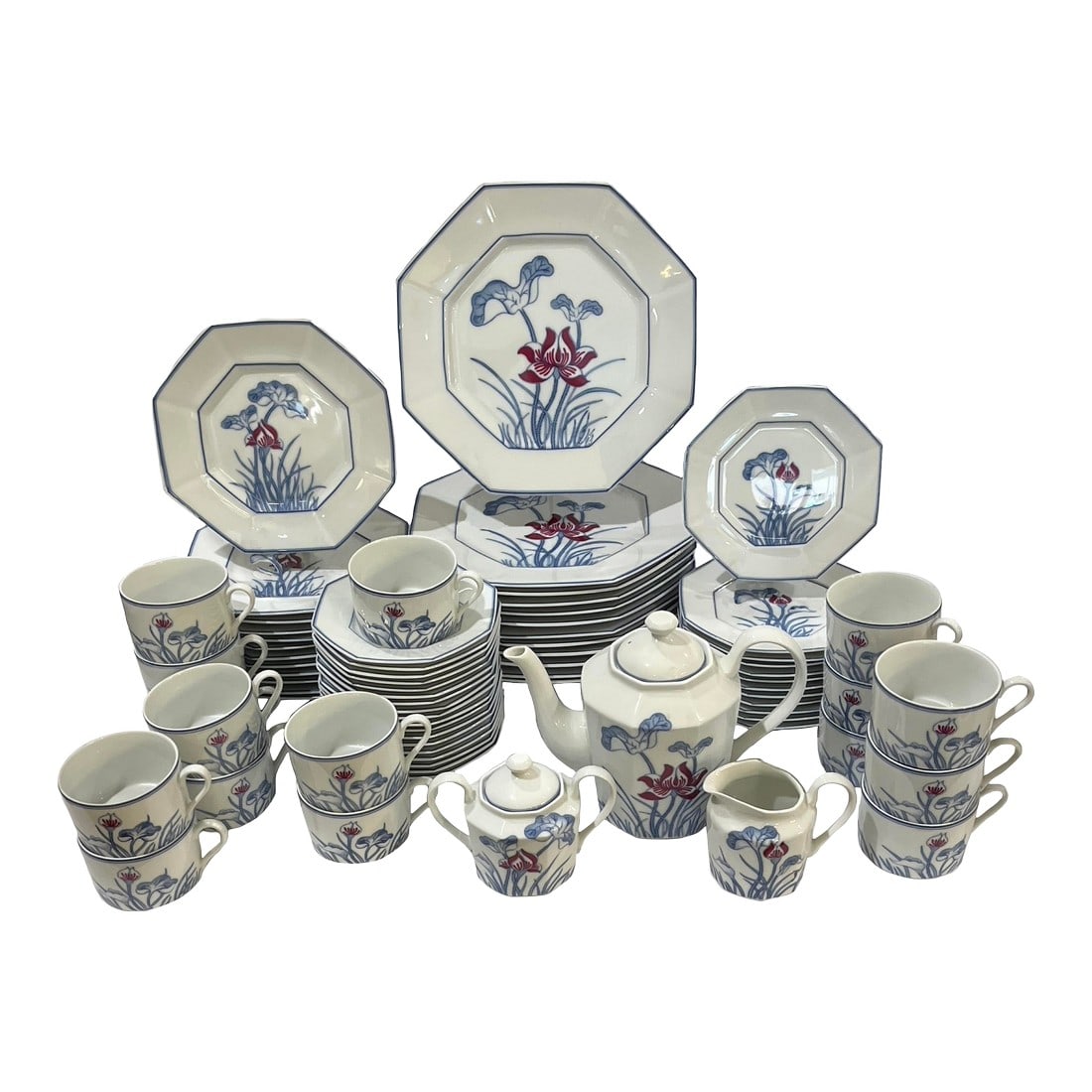 Rare - Fitz and Floyd Lotus Bleu 73 Piece Porcelain Dinnerware Service for 12 - Circa 1978: Introduced in 1978 - Fitz & Floyd's Lotus Bleu pattern was only produced for one year. Hence this service for twelve is very rare. Each octagonal porcelain form is underglaze decorated with a stylized