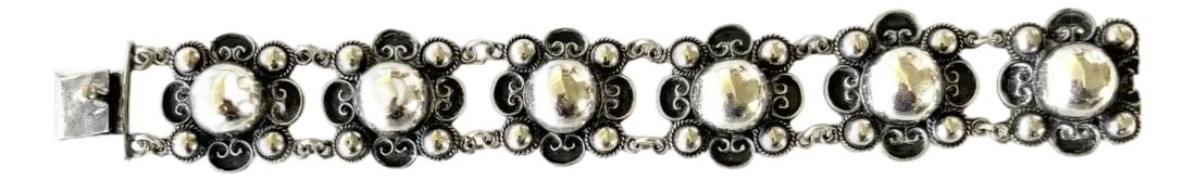 Vintage Mid-Century Sterling Silver Wrap Bracelet - Stamped: Gorgeous mid-century modern sterling silver wrap bracelet with individual linked pieces in the form of a flower. Stamped Mexico sterling. The mix of oxidized silver (blackened) against the shiny