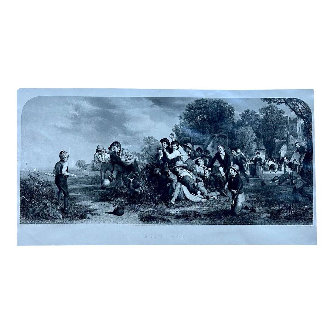 Game of Football: Reproduction print of a photogravure by W.H. Overend, published in 1891 in London. The work depicts an exciting moment during a football (soccer) game as one player prepares to throw the ball to his