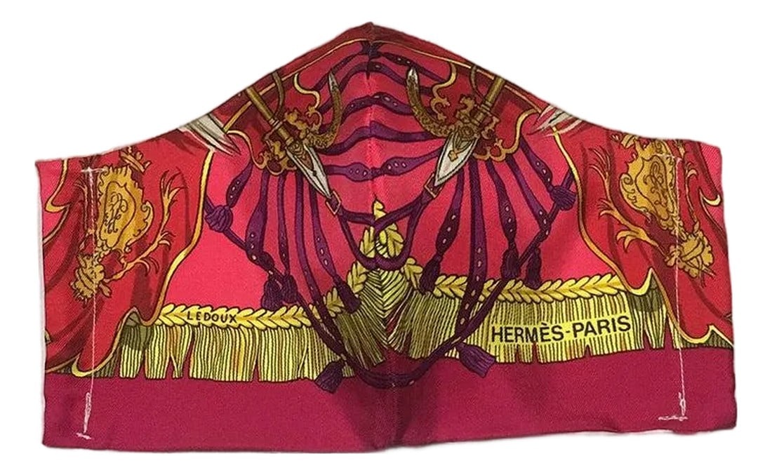 Handmade Vintage Hermes Caparacon de la France et de L'Inde Silk Scarf Face Mask: Original silk screen design c1959 by Philippe Ledoux features a red background with yellow fringe and rope, maroon riding belts and harnesses, a bull hook, and red and gold flags. Hermes Paris logo