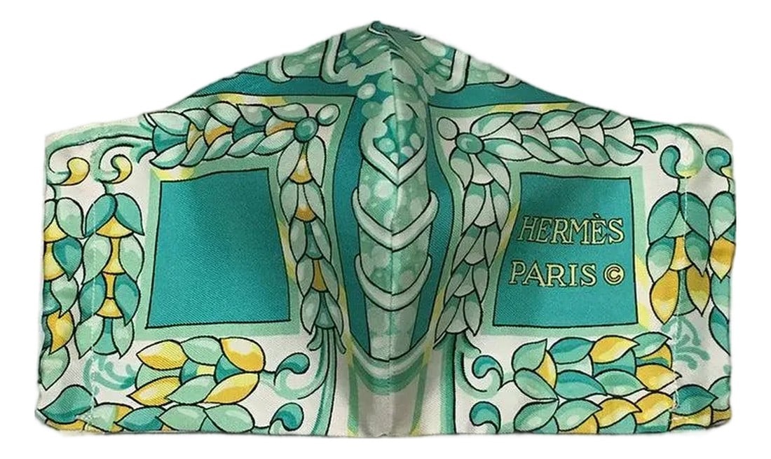 Handmade Vintage Hermes Scala Silk Scarf Face Mask: Original silk screen Authentic vintage Hermes Scala scarf design c.1974 by Francoise Heron; features a beautiful geometric ladder style design in various teals with yellow accents over a cream