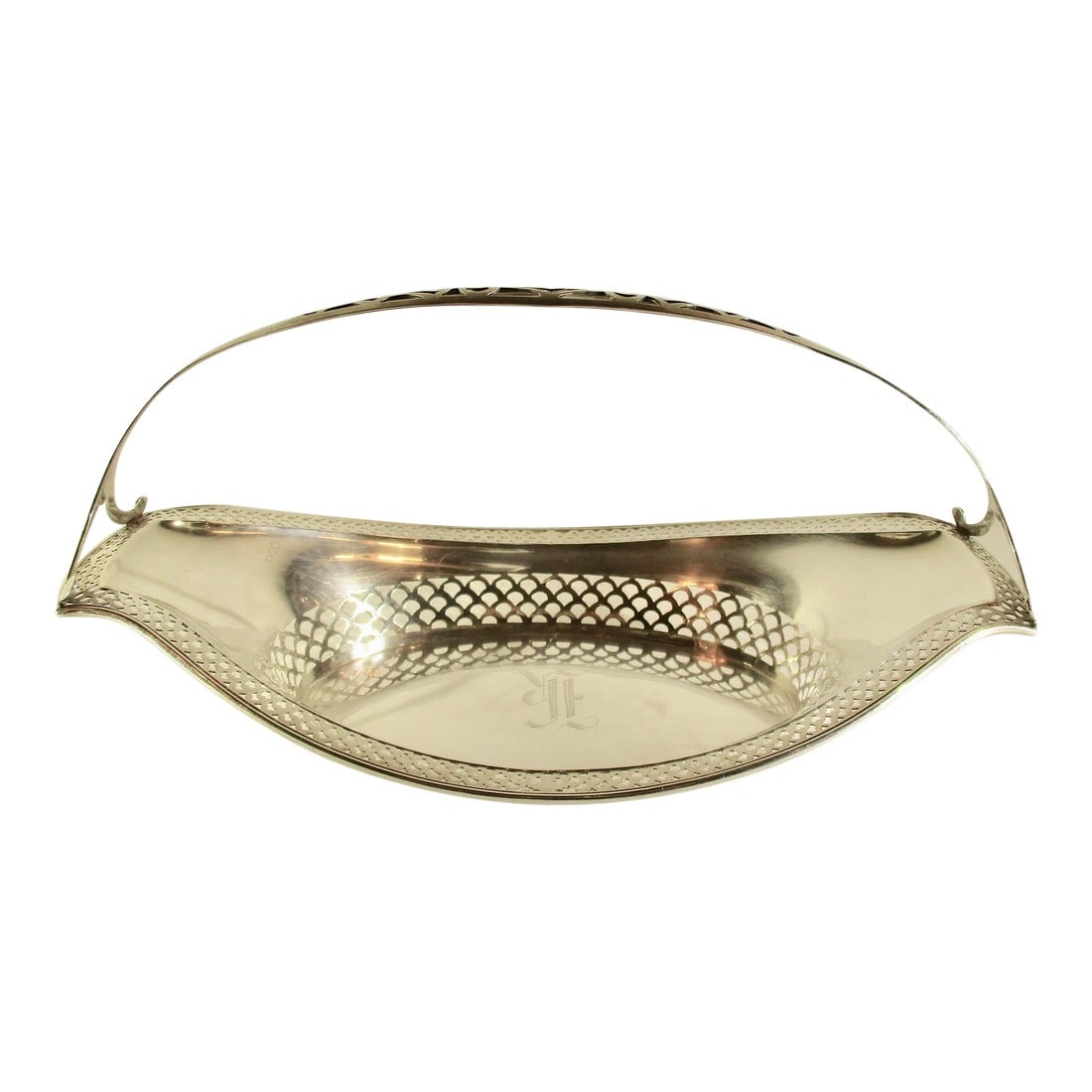 Art Deco Pierced Bread Basket With Handle Sterling 6 Troy Oz.: Sterling silver bread basket from the 1920's . 6 troy ounces. Manufacture by R Wallace & Sons. Pierced work around body and across handle. Monogram K to center of basket.. Size 11.25" long by 6.5 wide
