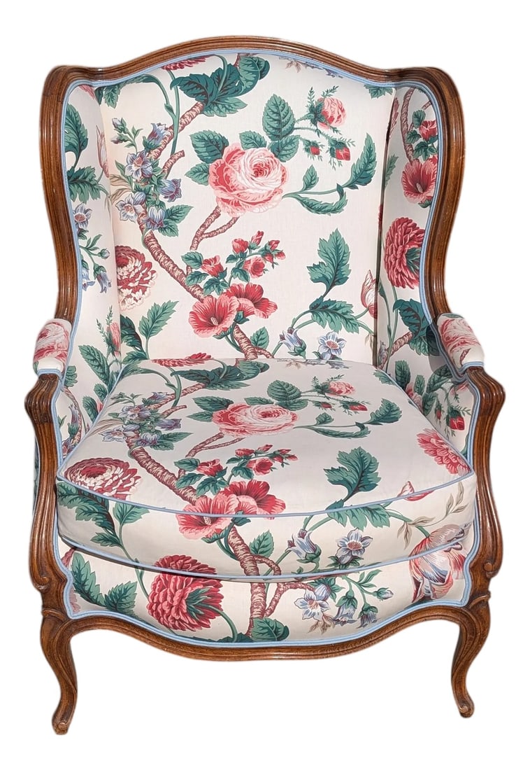 Early 20th Century French Country Louis XV Style Carved Walnut Bergere Chair: Absolutely fabulous & comfortable floral chair. Print even matches throughout the cushion and the seat. Condition: Alterations: Original Design Modified Imperfections: Some Imperfections Condition