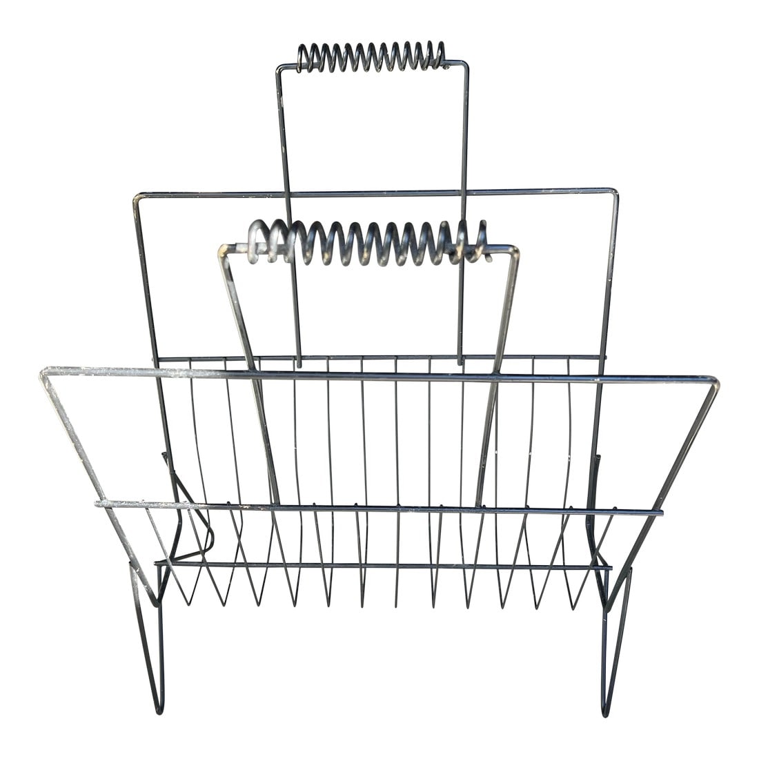 Vintage Mid-Century, Modern Magazine Rack: Up for consideration is a beautiful vintage mid century black metal magazine rack. This would look lovely in your home and it is a perfect conversation starter for your guests. This is also great for