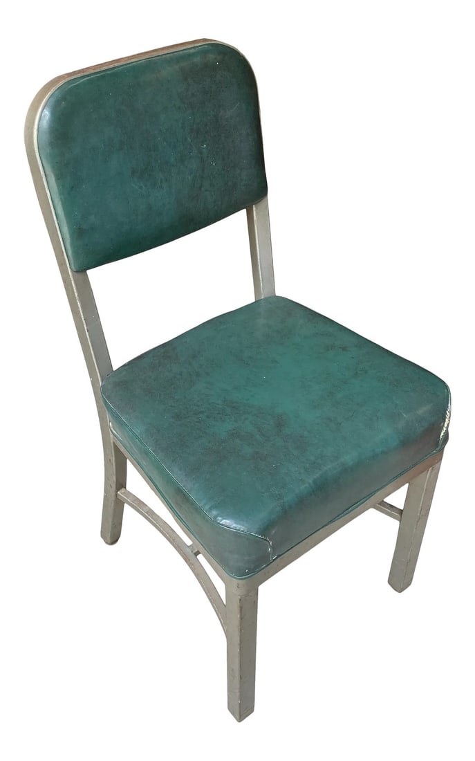1950s Green Industrial Metal Chair: Very cool, green and metal hipster industrial chair! Perfect for a photo prop of movie studio. Great addition to a mid century space. Condition: Alterations: Original Condition Unaltered
