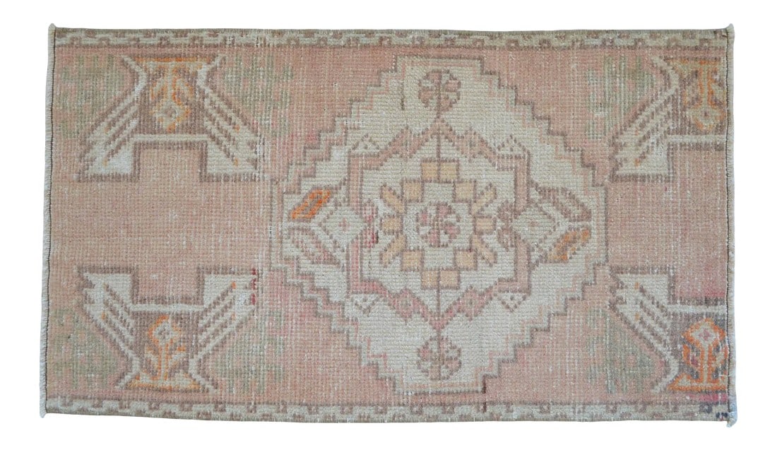 1970s Vintage Hand Knotted Small Rug: a Vintage Turkish Small yastik rug, perfect for entryway, bath or in front of the kitchen sink. Dimension: 19" x 33" or 1 ft 7 in x 2 ft 9 in Material: wool on cotton. Condition: Used - in fair condit