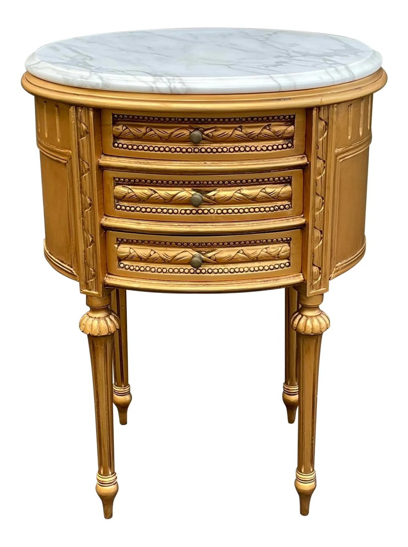 Andre Originals Louis XVI Nightstand: A gold Louis XVI French end table or nightstand with a marble top by Andre Originals Condition: Alterations: Original Condition Unaltered Imperfections: Some Imperfections Condition Notes: Great