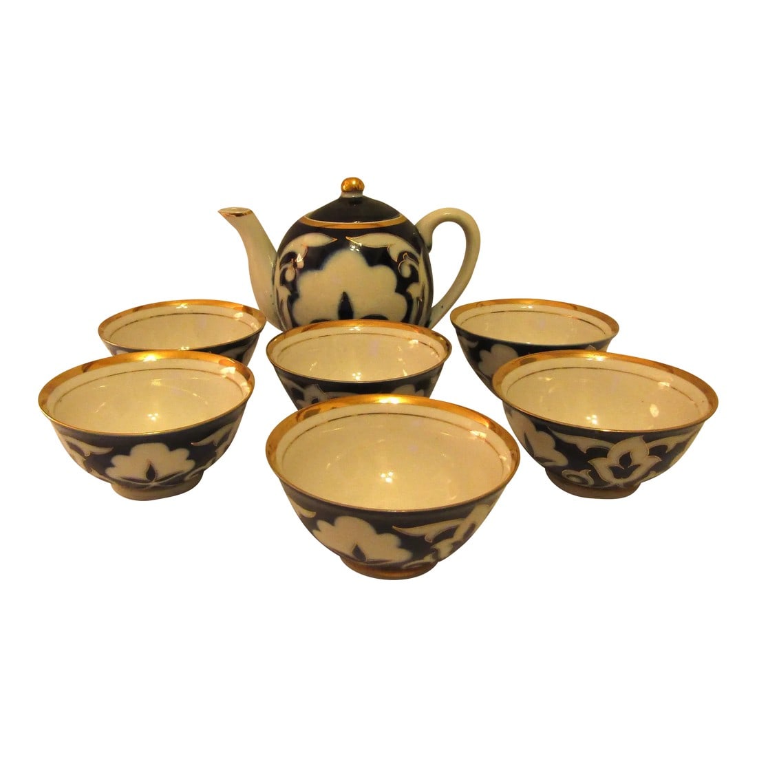 1940s Pahkta Porcelain Asian Cloud Floral 7 Piece Tea Set With Cups and Pitcher: Pahkta Porcelain Asian Cloud Floral 7 Piece Tea Set with Cups and Pitcher Marked to base. These come from the estate of a South Florida antique store. Includes: 1 - Teapot measuring 6" tall, 7 1/2"