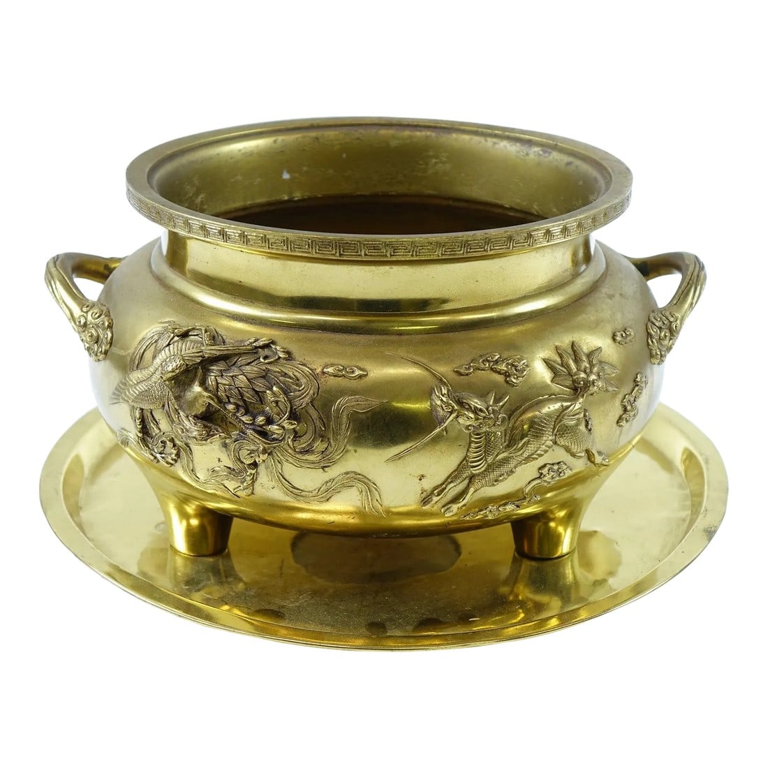 Early 20th Century Metal Chinese Flower Pot with Dragon Design: Early 20th Century Brass Chinese Flower Pot with Saucer – Dragon Design This early 20th-century Chinese brass flower pot is beautifully adorned with an intricate dragon design, showcasing tradit