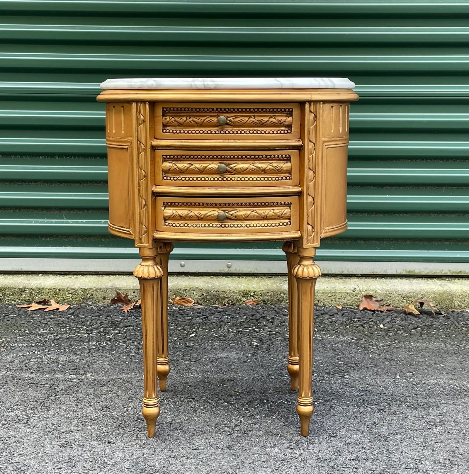 Andre Originals Louis XVI Nightstand: A gold Louis XVI French end table or nightstand with a marble top by Andre Originals Condition: Alterations: Original Condition Unaltered Imperfections: Some Imperfections Condition Notes: Great