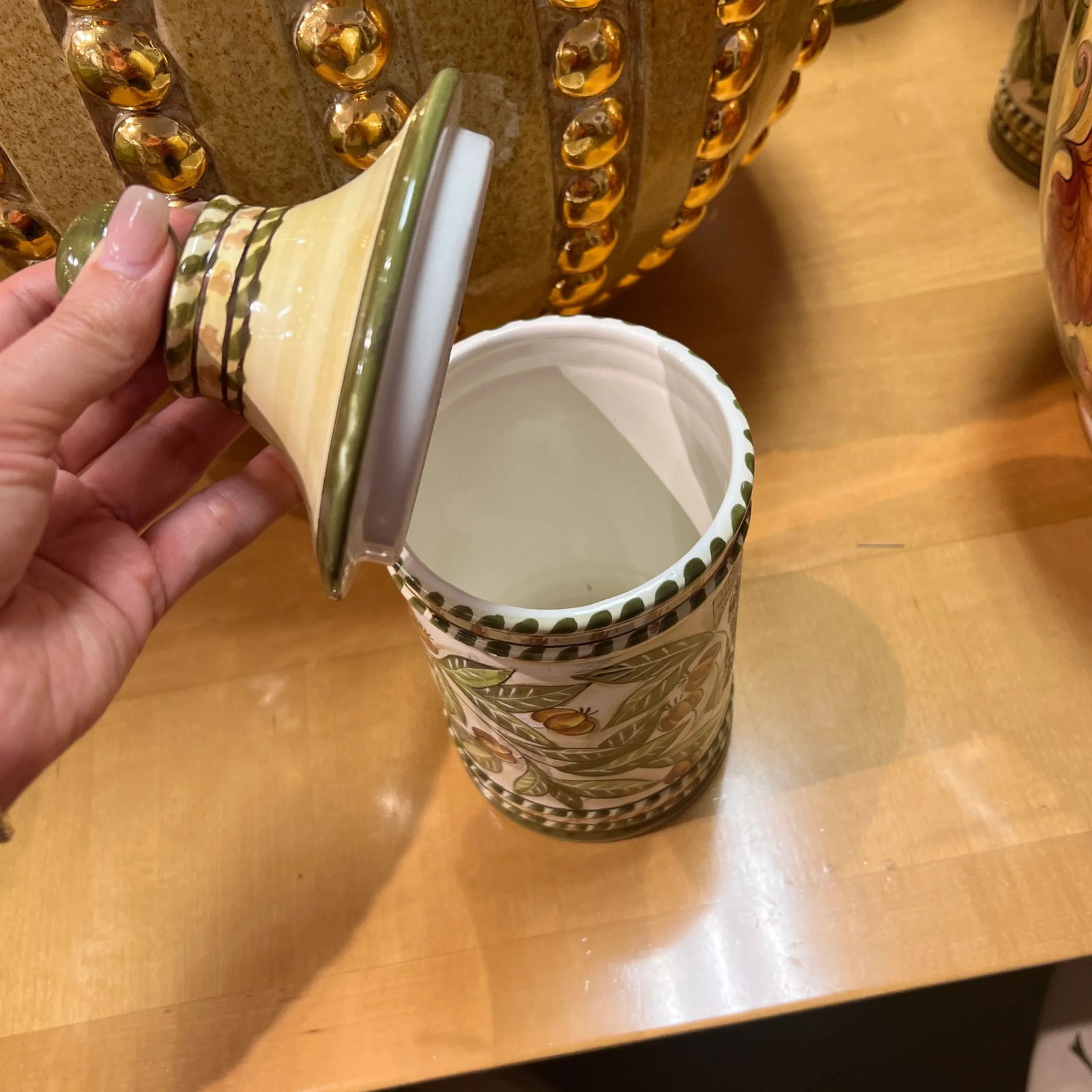 Italian Hand Painted Ceramic Canister With Lid in Ivory and Olive-Green Colors: Hand painted ceramic canister with lid in ivory and olive-green colors. Two others deign are available (Last Picture). Handmade items may vary in size, pattern and color. Created in Italy. 
