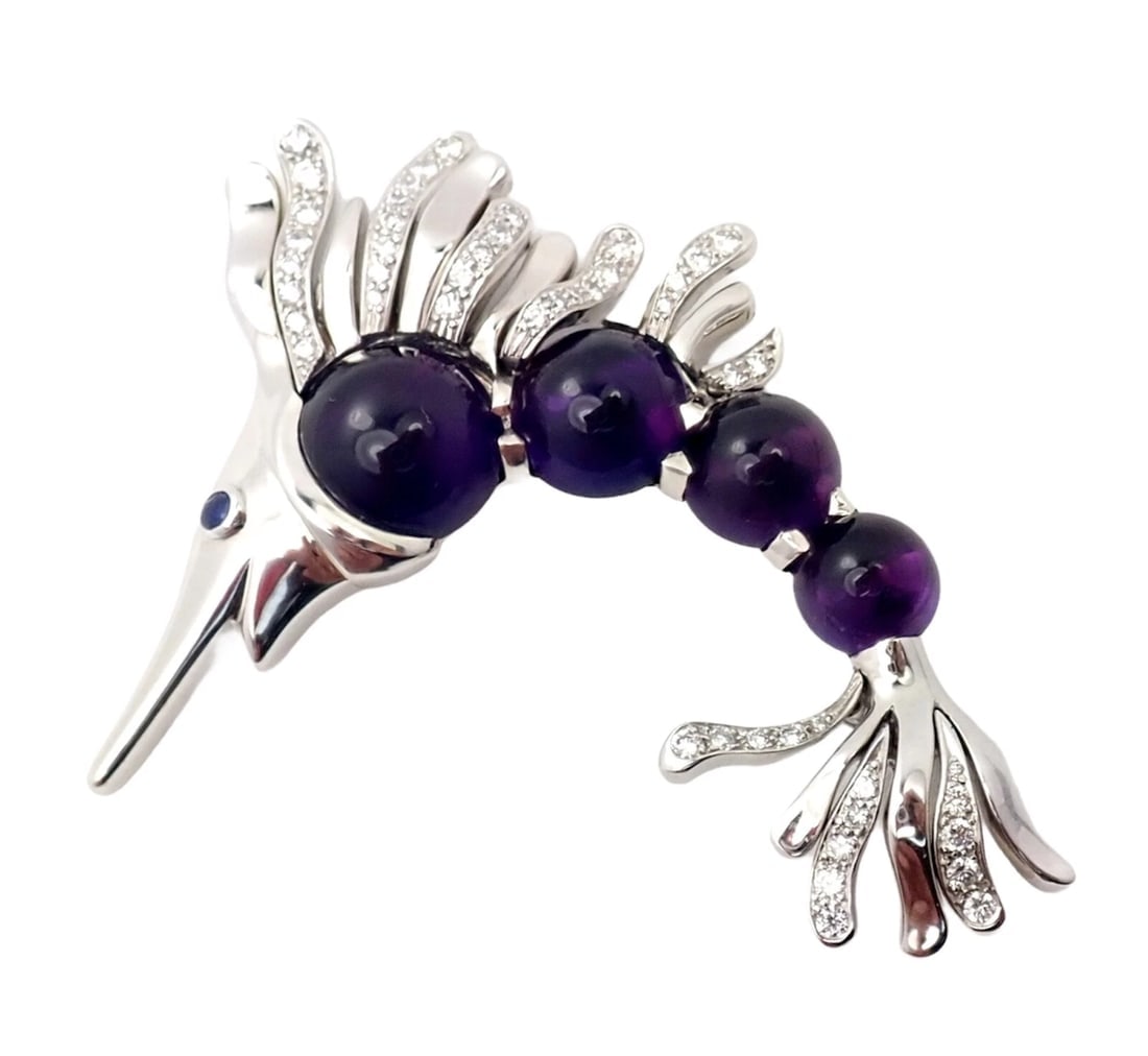 Chanel 18k White Gold Amethyst Diamond Miami Marlin Fish Brooch Pendant: Chanel 18k White Gold Amethyst Diamond Miami Marlin Fish Brooch Pendant About This Piece: About CHANEL: One of the most visible personalities of her era, Gabrielle Chanel invented a style that was syn