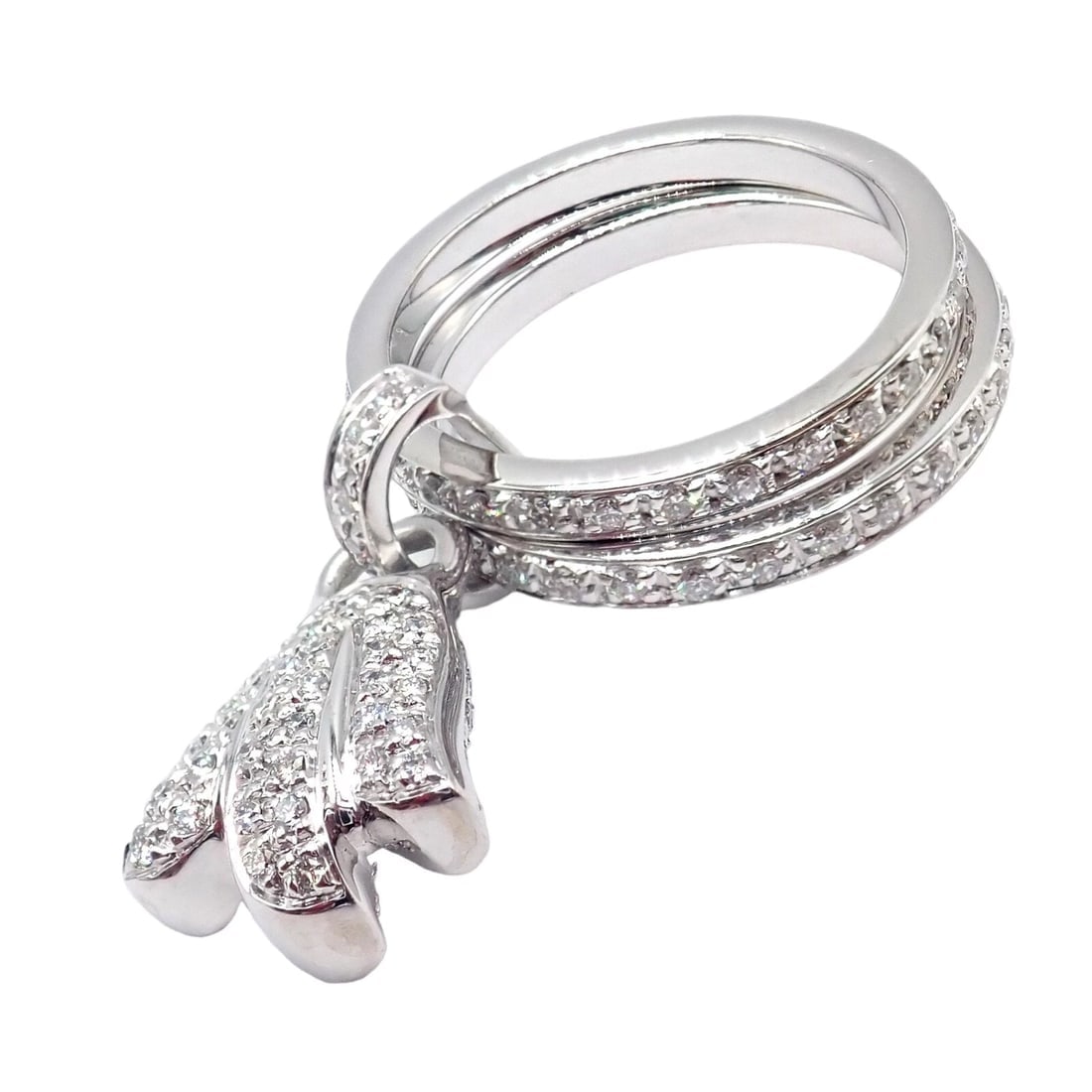 Authentic! Piaget 18k White Gold Diamond Double Band Flower Ring: Authentic! Piaget 18k White Gold Diamond Double Band Flower Ring About This Piece: The Authentic Piaget 18k White Gold Diamond Double Band Flower Ring is a stunning piece of jewelry. Crafted from genu