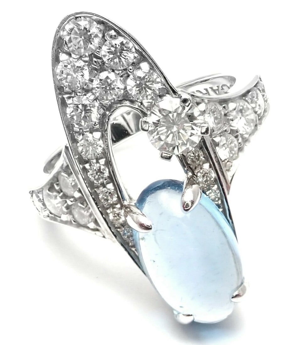 Rare! Authentic Bvlgari Bulgari Elysia 18k White Gold Diamond Blue Topaz Ring: Rare! Authentic Bvlgari Bulgari Elysia 18k White Gold Diamond Blue Topaz Ring About This Piece: Metal: 18k Yellow Gold Size: 6.25 Weight: Width: 6 grams 23mm Stones: 23 round brilliant cut diamonds VS