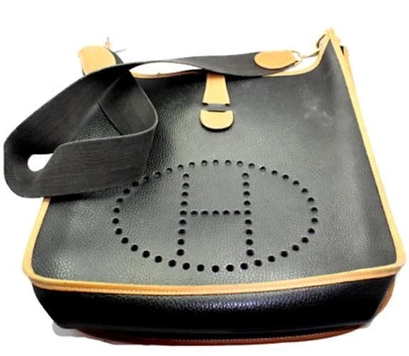 Authentic! Hermes Evelyne Black + Brown Trim Leather GM Handbag Purse: Authentic! Hermes Evelyne Black + Brown Trim Leather GM Handbag Purse About This Piece: Bag Hermes Evelyne Yellow Hardware Size: 13 inches x 14.5 inches x 3 inches Strap: 17" strap drop ALL MEASURES A