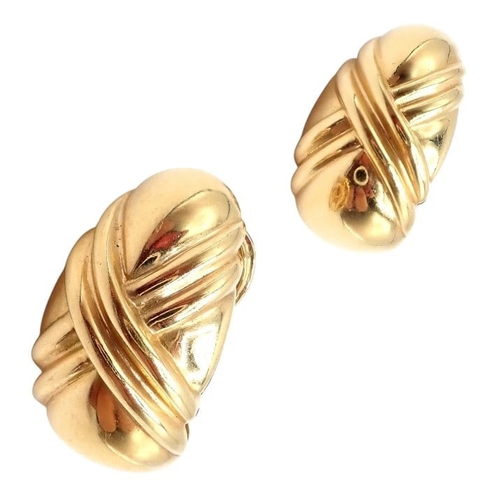 Authentic! Vintage Bulgari Bvlgari 18k Yellow Gold Roma Double X Huggie Earrings: Authentic! Vintage Bulgari Bvlgari 18k Yellow Gold Roma Double X Huggie Earrings About This Piece: These vintage Bulgari Roma huggie earrings are crafted in luxurious 18k yellow gold, featuring the ic