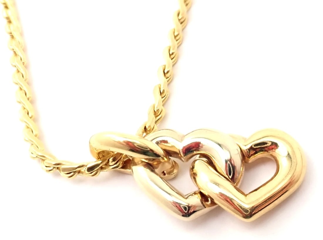 Authentic! Cartier 18k Yellow White Gold Double Heart Pendant S Chain Necklace: Authentic! Cartier 18k Yellow White Gold Double Heart Pendant S Chain Necklace About This Piece: Metal: 18k Yellow & White Gold Pendant: 29mm x 14mm Weight: Pendant 8.5 grams Chain 16.9 grams Total we