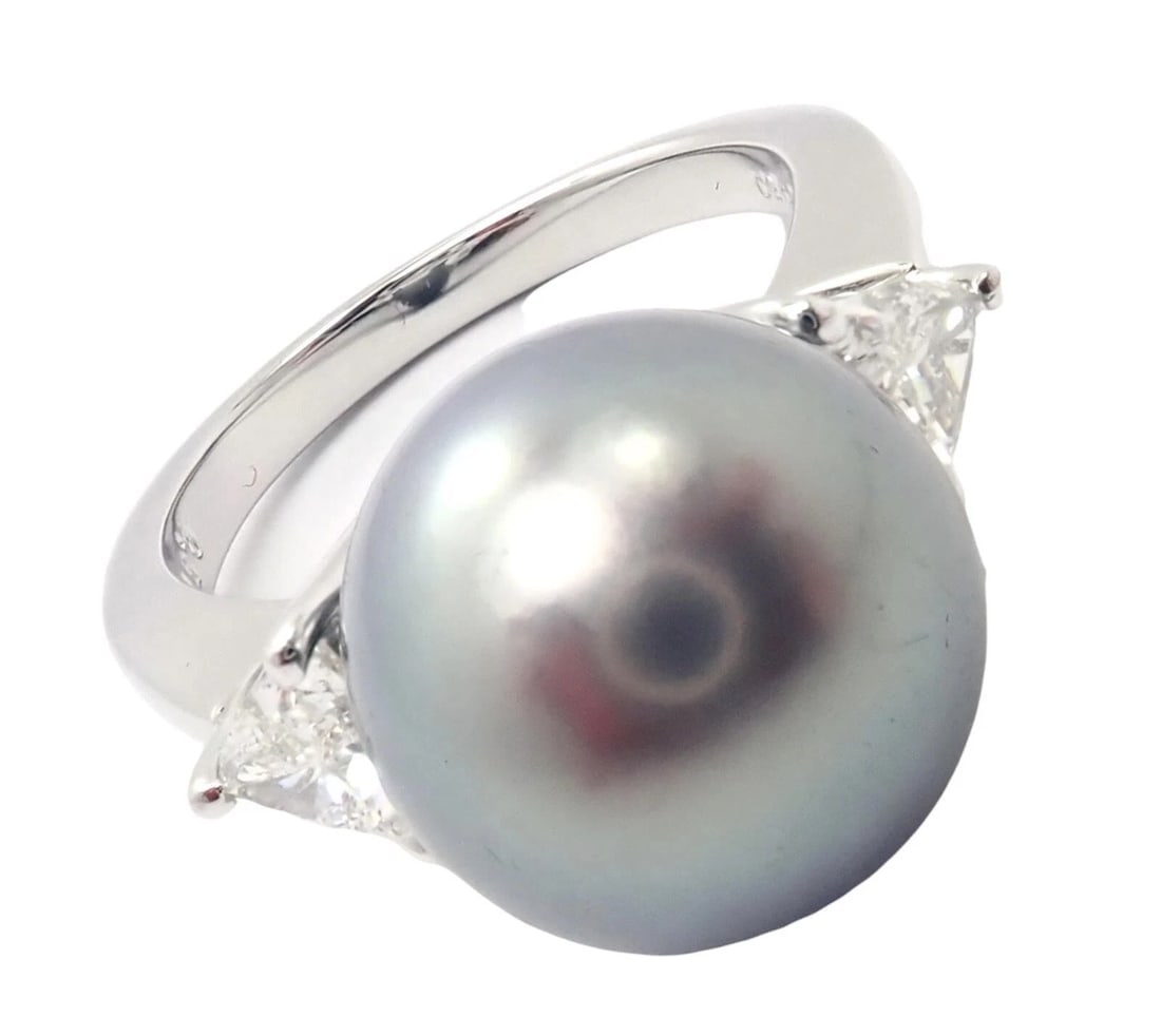 Rare! Mikimoto Platinum .5ctw Diamond 12mm Tahitian South Sea Pearl Heart Ring: Rare! Mikimoto Platinum .5ctw Diamond 12mm Tahitian South Sea Pearl Heart Ring About This Piece: Metal: Platinum Size: 5.5 Stones: 2x Trillion cut VS1 clarity, E color diamonds total weight approx. .5