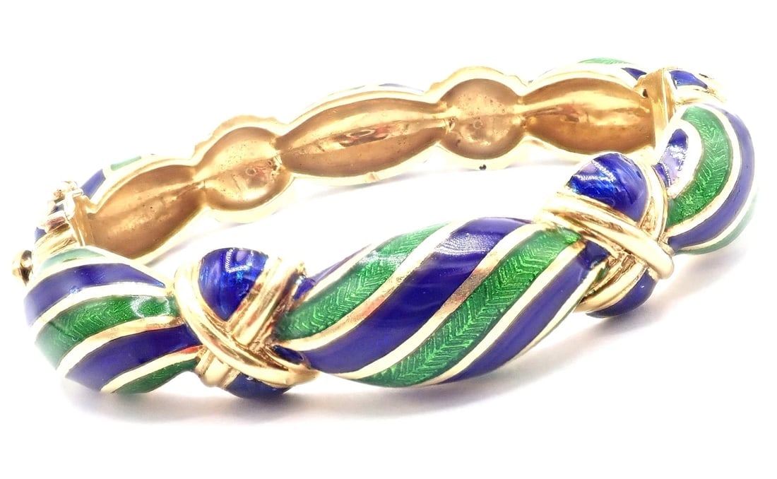 Authentic Vintage Tiffany & Co 18k Yellow Gold Green Blue Enamel Bangle Bracelet: Authentic Vintage Tiffany & Co 18k Yellow Gold Green Blue Enamel Bangle Bracelet About This Piece: Metal: 18k yellow gold Length: 7.5" Weight: Width: 67.7 grams 15mm Enamel: Blue and Green Enamel<br