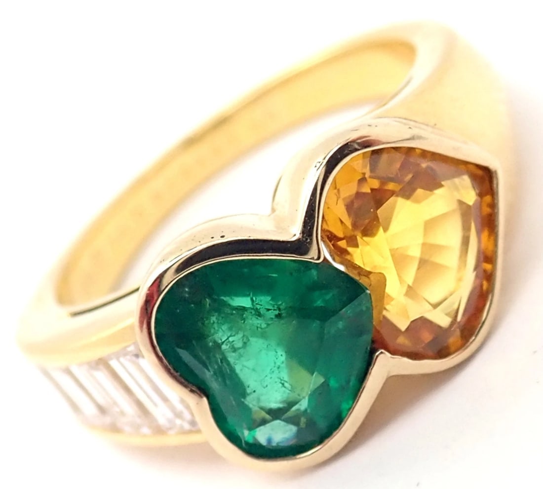 Authentic Van Cleef & Arpels 18k Gold Diamond Emerald Yellow Sapphire Ring Paper: Authentic Van Cleef & Arpels 18k Gold Diamond Emerald Yellow Sapphire Ring Paper About This Piece: Metal: 18k yellow gold Measurements: Size: 6 Width at Top: 9mm Weight 7.3 grams Stones: 7 emerald cut