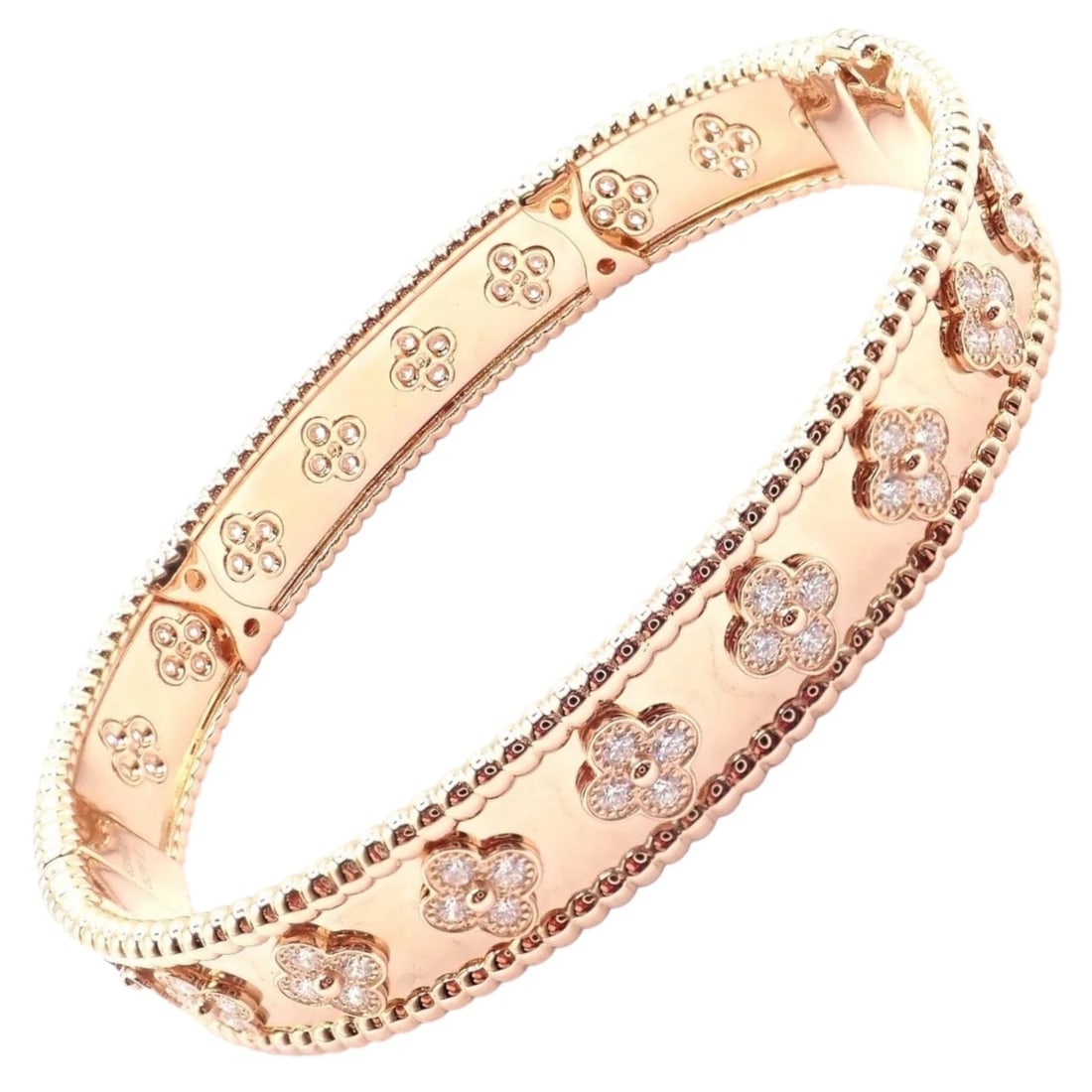 Authentic! Van Cleef & Arpels 18k Rose Gold Diamond Clovers Bangle Bracelet: Van Cleef & Arpels 18k rose gold bangle adorned with shimmering diamond-set clover motifs, symbolizing luck and elegance. Detailed beaded edges frame the polished surface, enhancing its refined artist