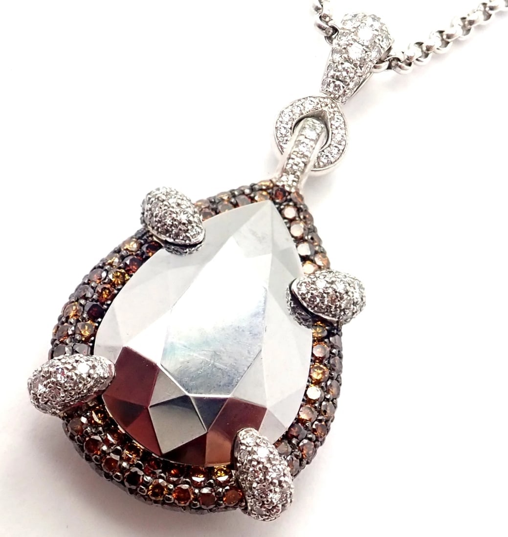 Authentic! Chopard Golden Diamonds 18k White Gold Diamond Chrome Stone Necklace: Authentic! Chopard Golden Diamonds 18k White Gold Diamond Chrome Stone Necklace About This Piece: Metal: 18k White Gold Measurements: Length: 16.5" Width: 2mm Pendant: 40mm x 19mm Weight: 20.3 grams S