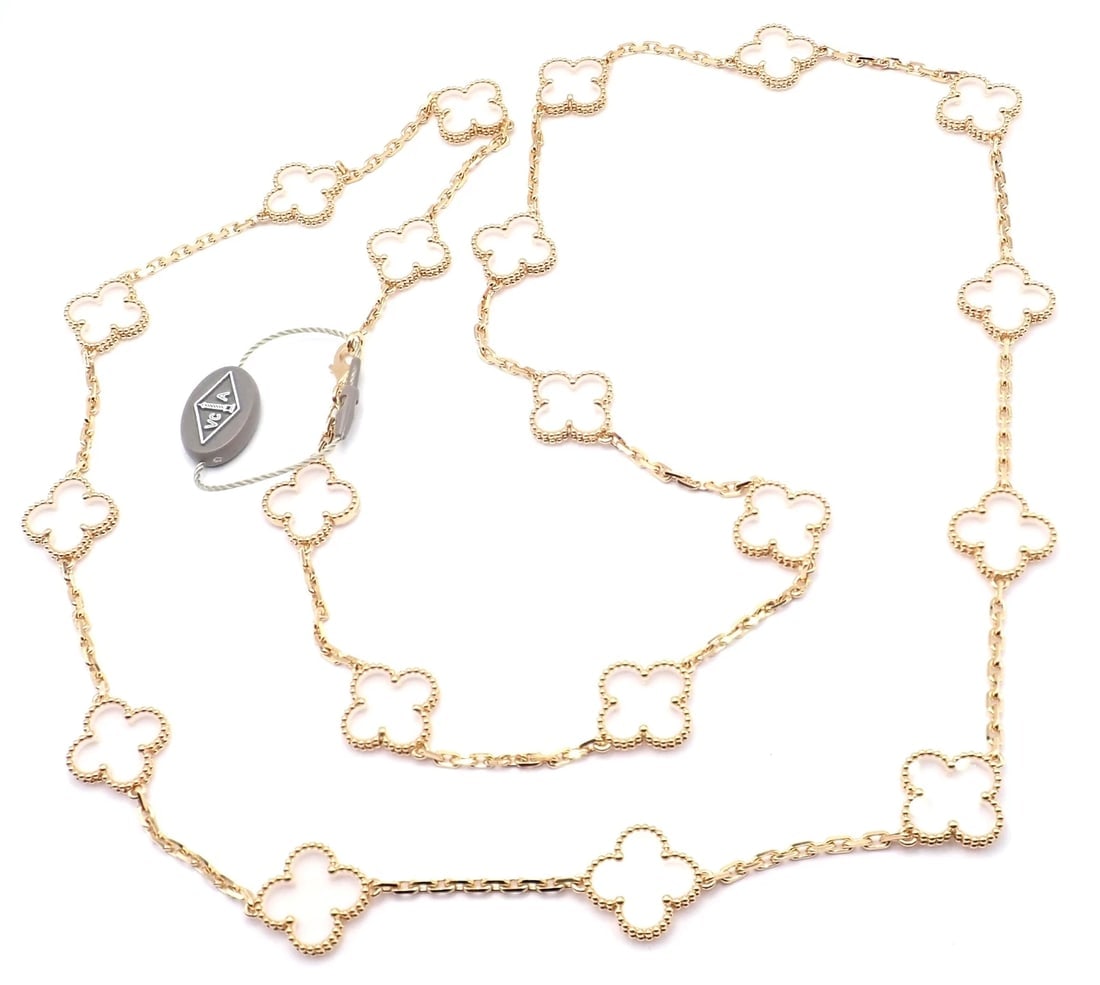 Van Cleef & Arpels 18k Yellow Gold 20 Motif Alhambra Rock Crystal Necklace Cert: Van Cleef & Arpels 18k Yellow Gold 20 Motif Alhambra Rock Crystal Necklace Cert About This Piece: Exquisitely crafted, the Van Cleef & Arpels 18k Yellow Gold 20 Motif Alhambra Rock Crystal Necklace ex