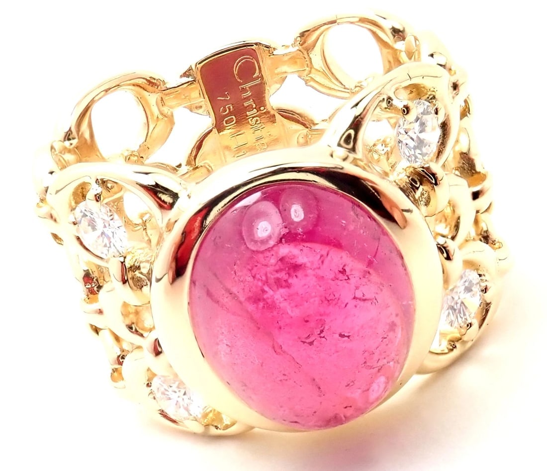Authentic Christian Dior 18k Yellow Gold Diamond Large Pink Tourmaline Band Ring: Authentic Christian Dior 18k Yellow Gold Diamond Large Pink Tourmaline Band Ring About This Piece: About Christian Dior Jewelry: Towards the end of last century, fine jewelry was missing the whimsical