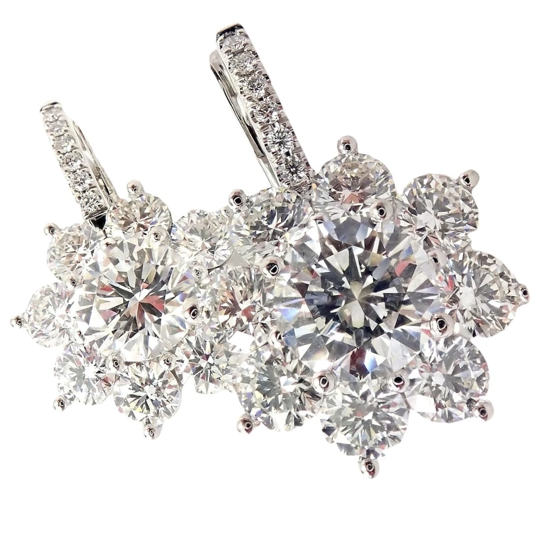 Authentic! T Foster & Co Platinum Flower 4.84ctw Diamond Stud Halo Earrings GIA: Authentic! T Foster & Co Platinum Flower 4.84ctw Diamond Stud Halo Earrings GIA About This Piece: These earrings are for pierced ears. Metal: Platinum Measurements: Width: 13mm Height: 20mm Weight: 6.