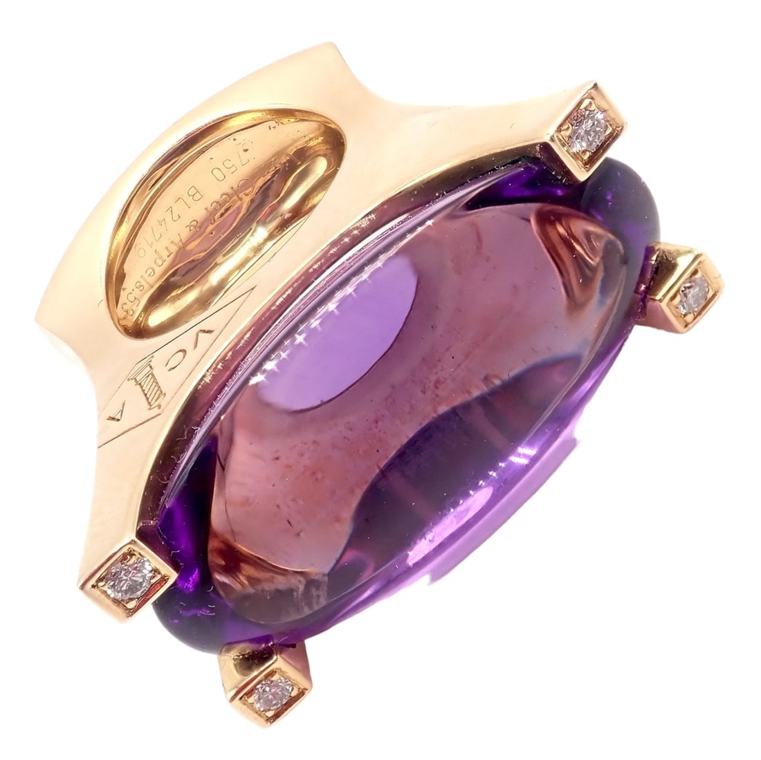Van Cleef & Arpels Electra 18k Yellow Gold Diamond Large Amethyst Ring Paper: Van Cleef & Arpels Electra 18k Yellow Gold Diamond Large Amethyst Ring Paper About This Piece: An exquisite Van Cleef & Arpels ring, crafted from 18k yellow gold, features a large, captivating amethys