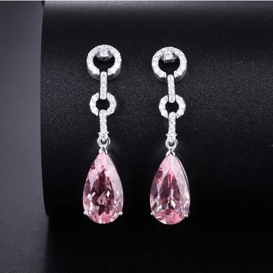 14K GOLD 5.17 CTW NATURAL MORGANITE & DIAMOND EARRINGS: Title:14K GOLD 5.17 CTW NATURAL MORGANITE & DIAMOND EARRINGSDescription:Ref:230528366Gold Content:14K GoldMain Gemstone:MorganiteNumber of stones:2Shape:PearCarat Weight:4.85ct