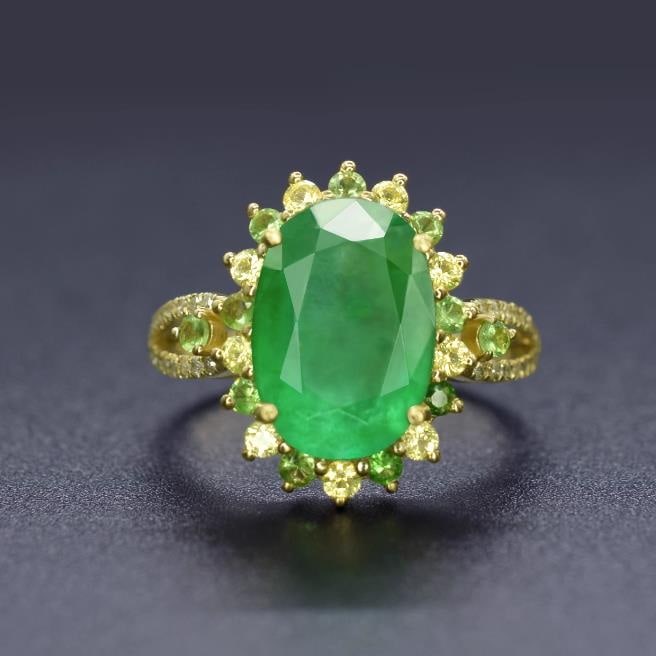14K GOLD 3.10 CTW NATURAL EMERALD & DIAMOND RING: Title:14K GOLD 3.10 CTW NATURAL EMERALD & DIAMOND RING Description:Ref:230528360Gold Content:14K GoldRing Size:7.25USMain Gemstone:EmeraldNumber of stones:1Shape:OvalCarat Weight:3.01ct Color:GreenTre