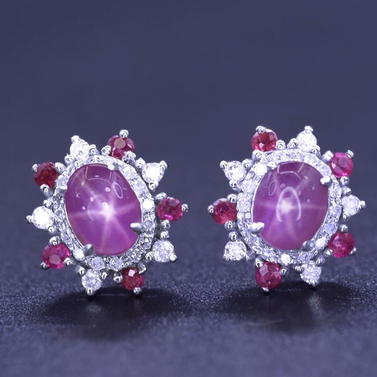 14K GOLD 2.08 CTW NATURAL STAR SAPPHIRE & DIAMOND EARRINGS: Title:14K GOLD 2.08 CTW NATURAL STAR SAPPHIRE & DIAMOND EARRINGSDescription:Ref:230528359Gold Content:14K GoldMain Gemstone:Star SapphireNumber of stones:2Shape:OvalCarat Weight:1.77ct