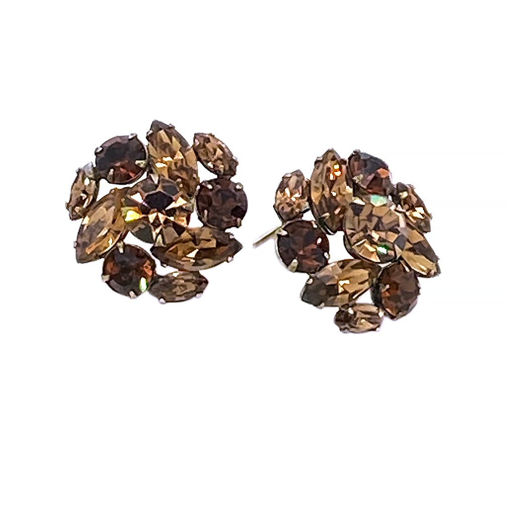 Regency Topaz Rhinestone Earrings: Here is a pair of Regency topaz rhinestone earrings. These are cluster clip-back earrings with two tones of round and marquise rhinestones and prong-set on antique brass tone metal. Signed on another